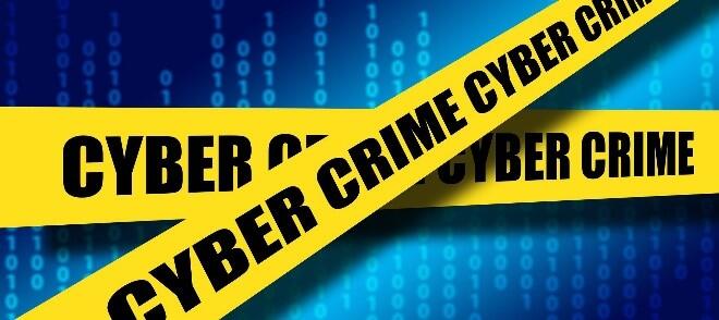 Yellow crime tape with the words Cyber Crime 