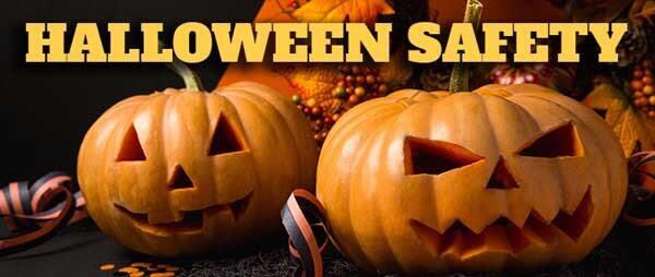 Two jack-o-lanterns with HALLOWEEN SAFETY written above them